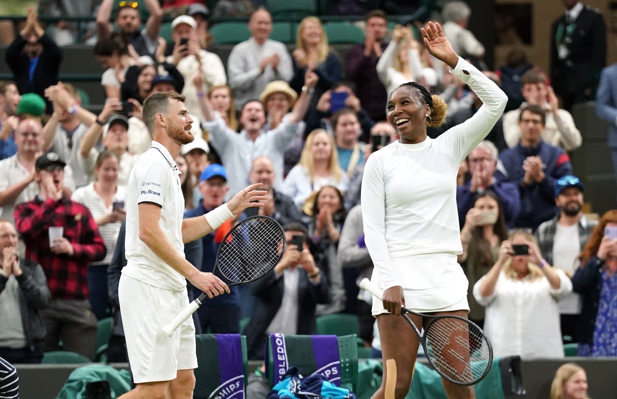 Jamie Murray and Venus Williams celebrate victory in the mixed doubles at Wimbledon (Zac Goodwin/PA) (PA Wire)