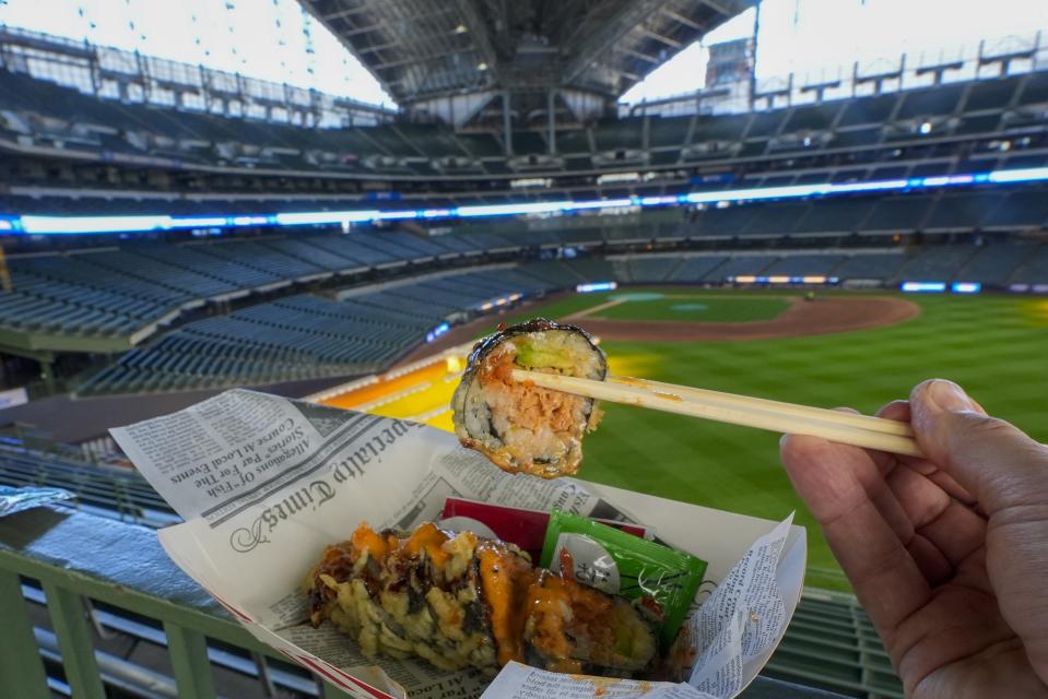 Some sushi is seen at American Family Field in Milwaukee during an event to show off some foods that fans can get at a game Thursday, March 28, 2024. Most parks and arenas have a handful of areas that offer salads, gluten free or vegan offerings if fans are willing to hunt a little. But the vast majority of people attending baseball games aren't necessarily looking to eat healthy. (AP Photo/Morry Gash)