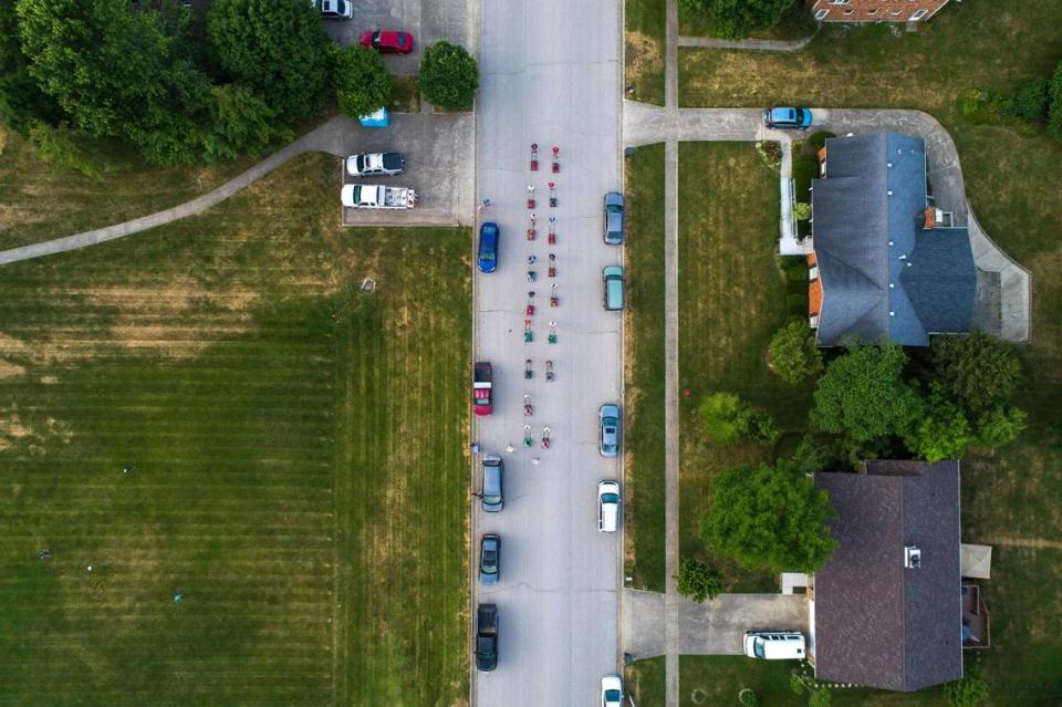 The Wilmore Lawnmower Brigade rehearses precision maneuvers ahead of Monday’s Fourth of July parade in Wilmore, Ky.