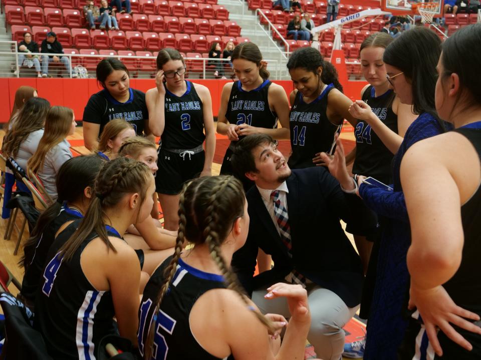 The Sanford-Fritch girls basketball team gathers during a timeout against West Texas Stinnett on Friday, February 10, 2023 at the Stinnett Events Center.