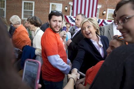 U.S. Democratic presidential candidate Hillary Clinton shakes hands with supporters after a community forum campaign event at Cornell College in Mt Vernon, Iowa, October 7, 2015. REUTERS/Scott Morgan