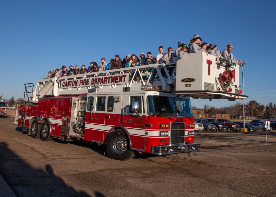 The Canton IMS wrestling team was escorted to school Monday morning by the Canton Fire Department following a successful weekend at the state tournament.