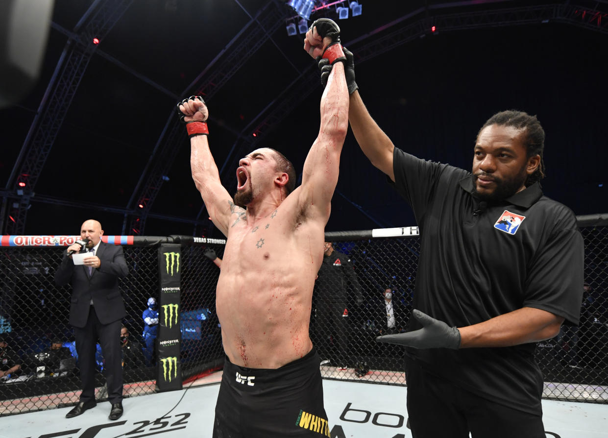 ABU DHABI, UNITED ARAB EMIRATES - JULY 26: Robert Whittaker of New Zealand celebrates after his victory over Darren Till of England in their middleweight fight during the UFC Fight Night event inside Flash Forum on UFC Fight Island on July 26, 2020 in Yas Island, Abu Dhabi, United Arab Emirates. (Photo by Jeff Bottari/Zuffa LLC via Getty Images)