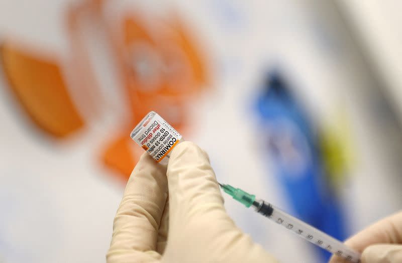 FILE PHOTO: Children are being vaccinated against COVID-19 in Maintal near Frankfurt