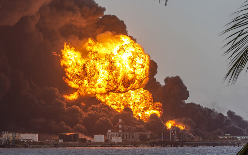 Flames and smoke rise from the Matanzas Supertanker Base