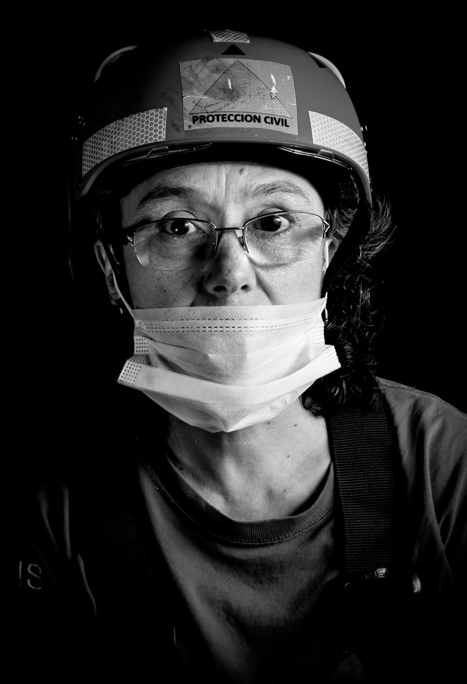 <p>Arlette Salyano, a lawyer who volunteered as a specialist in integral management in disaster risks after the 7.1 earthquake that hit Mexico on Sept. 19, poses for pictures in Mexico City on Sept. 25, 2017. What struck Salyano the most was that the reaction of the people was the same as that for the quake of 1985. (Photo: Omar Torres/AFP/Getty Images) </p>