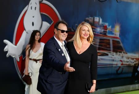 Executive producer Dan Aykroyd and his wife Donna pose at the premiere of the film "Ghostbusters" in Hollywood, California U.S., July 9, 2016. REUTERS/Mario Anzuoni