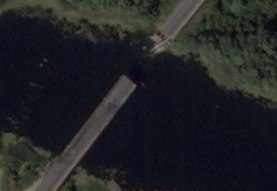 A satellite image shows a bridge collapsed over the Seim River in the Glushkovsky district on August 17 following a Ukrainian strike in the Kursk region.