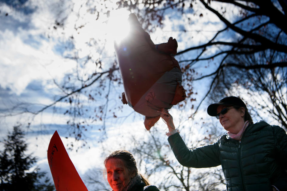 Activists rally for a President's Day protest against US President Donald Trump in Lafayette Square near the White House Feb. 18, 2019 in Washington, DC.  (Photo: Brendan Smialowski/AFP/Getty Images)