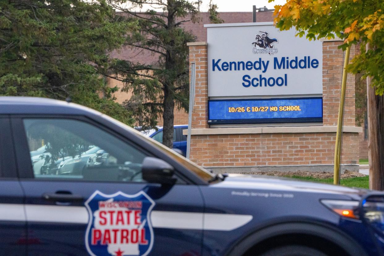 A State Patrol car blocks an entrance Tuesday, October 24, 2023 at Kennedy Middle School, N118 W15860 Williams Dr. in Germantown, Wisconsin.