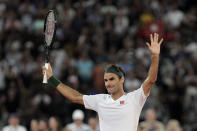 Roger Federer thanks the crowd after winning 3 sets to 2 against Rafael Nadal in their exhibition tennis match held at the Cape Town Stadium in Cape Town, South Africa, Friday Feb. 7, 2020. (AP Photo/Halden Krog)