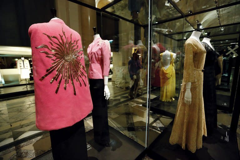 A "Phoebus" cape by Italian designer Elsa Schiaparelli (1938-1939) is seen on display at the storage of the Galliera fashion museum in Paris, on February 25, 2013. A landmark exhibition due to open in Paris on Saturday traces the history of haute couture through some of the most exquisite dresses ever made