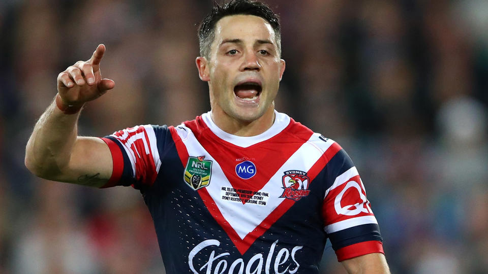 Cooper Cronk signals to teammates. (Photo by Cameron Spencer/Getty Images)