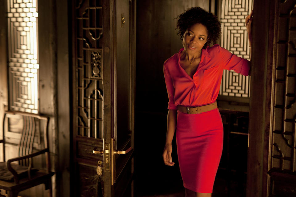 This film image released by Sony Pictures shows Naomie Harris in a scene from the film "Skyfall." Costume designer Jany Temime says her mantra for the entire wardrobe of “Skyfall,” which opens Friday, was “iconic for 2012.” (AP Photo/Sony Pictures, Francois Duhamel)