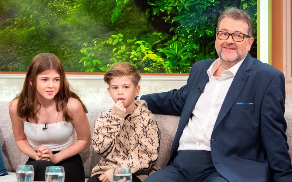 Derek Draper with his children, Darcey and William, in 2019