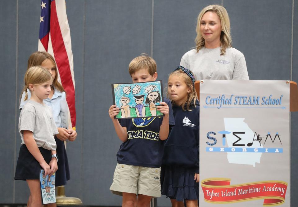 A group of 2nd graders give a presentation during the Tybee Island Maritime Academy's 10th anniversary celebration on Thursday, September 28, 2023.