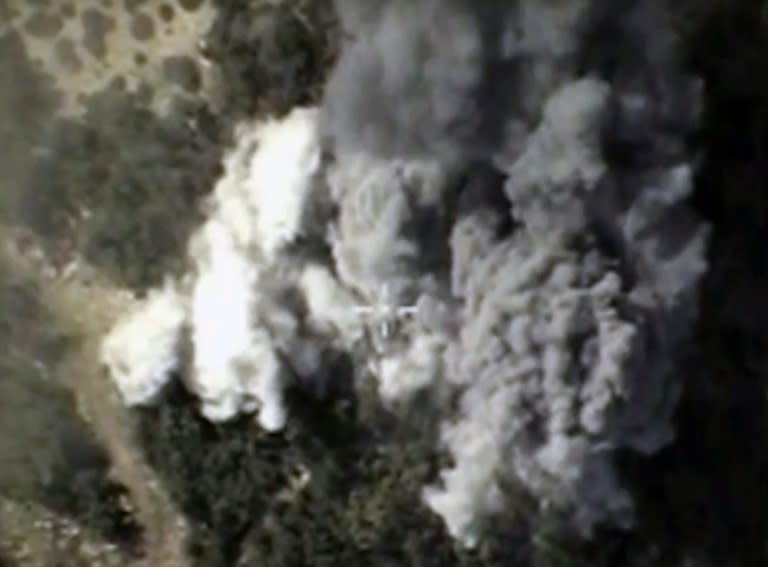 An image purportedly showing explosions after air strikes carried out by Russia's air force in the Syrian province of Latakia