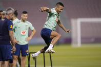 Brazil's Gabriel Jesus exercises during a training session at the Grand Hamad stadium in Doha, Qatar, Tuesday, Nov. 29, 2022. Brazil will face Cameroon in a group G World Cup soccer match on Dec. 2. (AP Photo/Andre Penner)