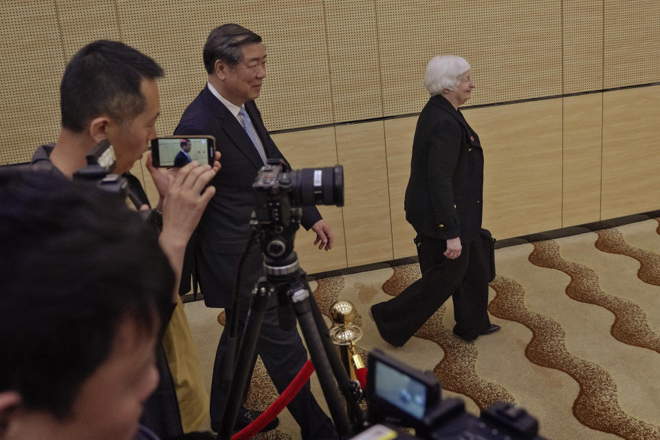 Journalists film U.S. Treasury Secretary Janet Yellen, right, and Chinese Vice Premier He Lifeng arrive for a one-to-one meeting at the Guangdong Zhudao Guest House in southern China's Guangdong province, Saturday, April 6, 2024. (AP Photo/Andy Wong, Pool)