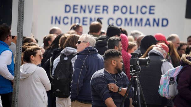 PHOTO: Parents wait for students to be walked out after as shooting at Denver East High School, March 22, 2023, in Denver. (David Zalubowski/AP)