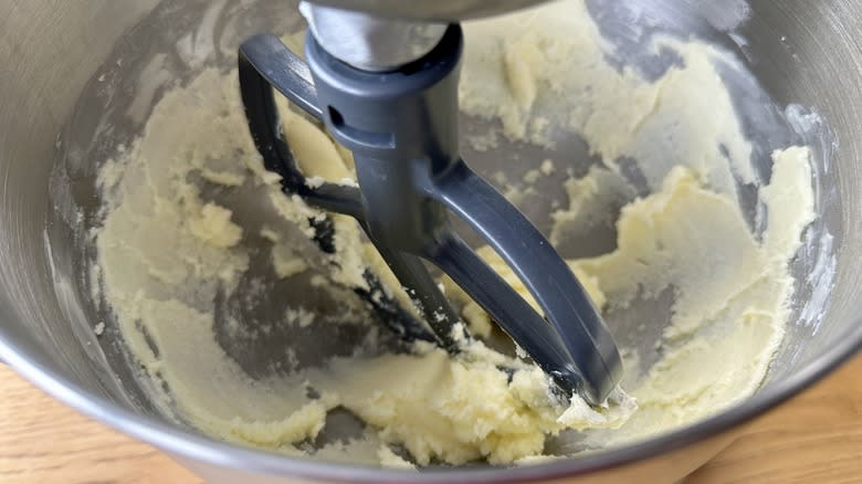 Butter and sugar beaten in bowl