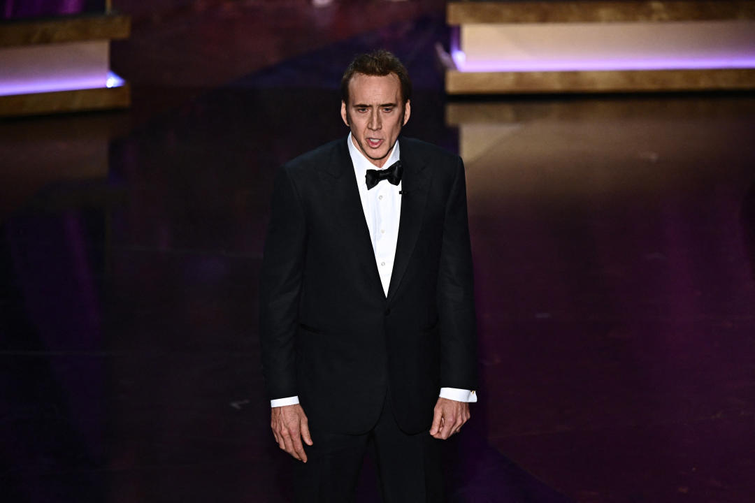 US actor Nicolas Cage presents the award for Best Actor in a Leading Role onstage during the 96th Annual Academy Awards at the Dolby Theatre in Hollywood, California on March 10, 2024. (Photo by Patrick T. Fallon / AFP) (Photo by PATRICK T. FALLON/AFP via Getty Images)