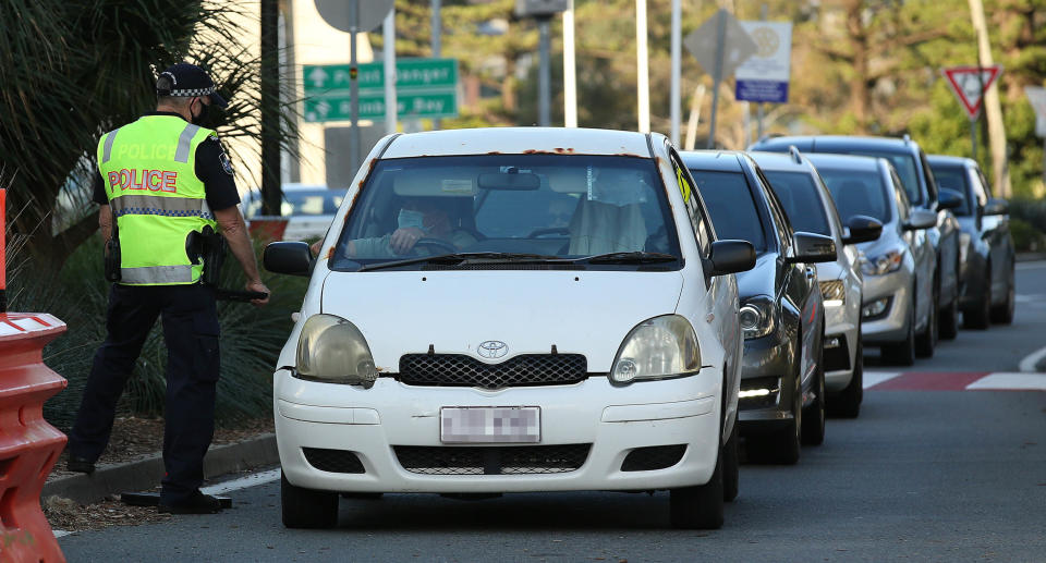 Police check cars at the QLD/NSW border, Gold Coast, Thursday, September 2, 2021. Source: AAP