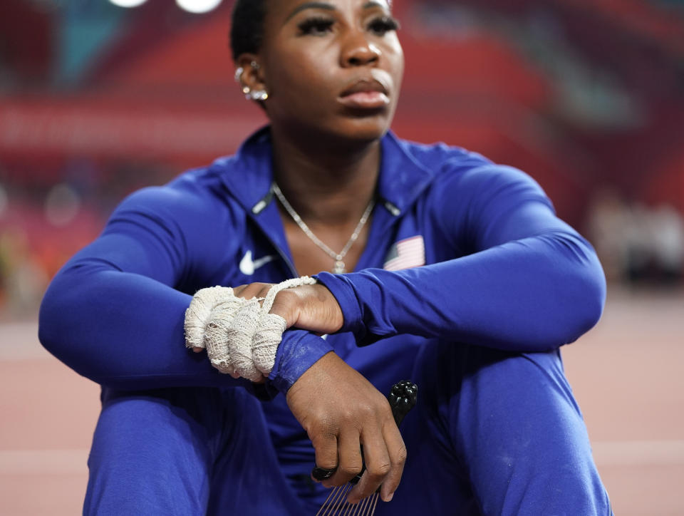 Gwen Berry, of the United States, waits for the women's hammer throw final to begin at the World Athletics Championships in Doha, Qatar, Saturday, Sept. 28, 2019. (AP Photo/David J. Phillip)