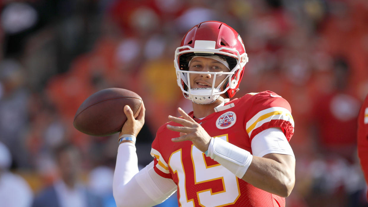 Kansas City Chiefs quarterback Patrick Mahomes (15) warms up before an NFL preseason football game against the Cincinnati Bengals in Kansas City, Mo., Saturday, Aug. 10, 2019. (AP Photo/Colin E. Braley)