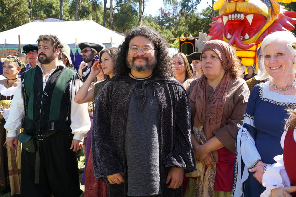 Yahoo Entertainment writer Robert Clarke-Chan, center, as an extra (Photo: CBS)