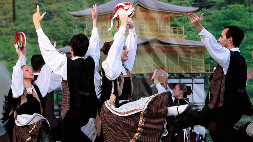 Descendants of Italian immigrants do a traditional dance in Brazil