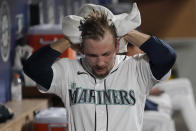 Seattle Mariners pitcher Anthony Misiewicz reacts in the dugout after he was pulled during the eighth inning of a baseball game against the Baltimore Orioles, Monday, May 3, 2021, in Seattle. (AP Photo/Ted S. Warren)