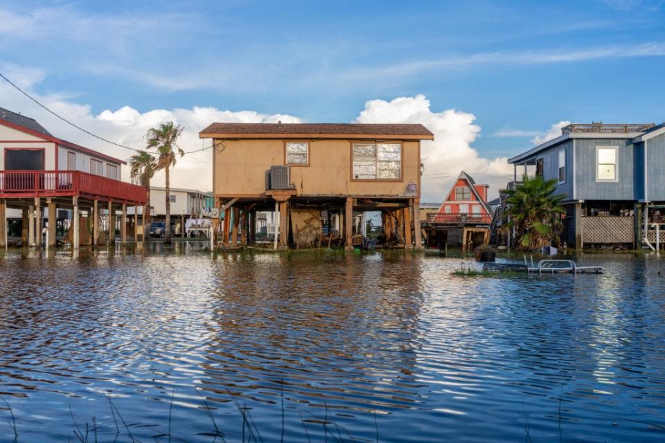 Homes surrounded in floodwater in Surfside, Texas after Hurricane Beryl.