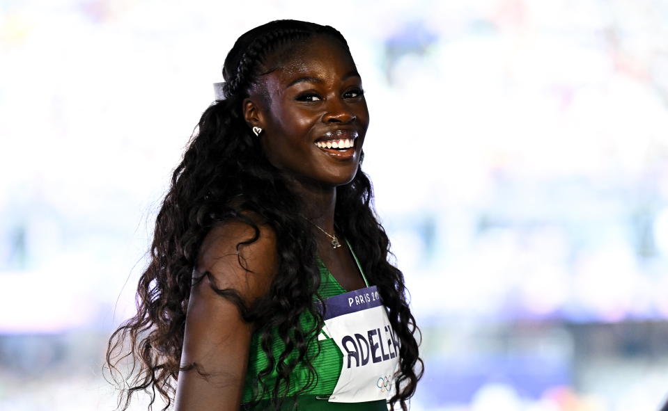 Team Ireland's Rhasidat Adeleke smiles after winning the women's 400 metres in the first round.