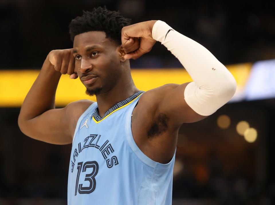 Jaren Jackson Jr. (13) celebrates a big first-half bucket for the Grizzlies.