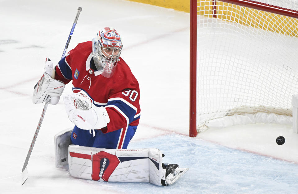 Montreal Canadiens goaltender Cayden Primeau gives up a goal to Florida Panthers' Evan Rodrigues during the third period of an NHL hockey game in Montreal, Thursday, Nov. 30, 2023. (Graham Hughes/The Canadian Press via AP)