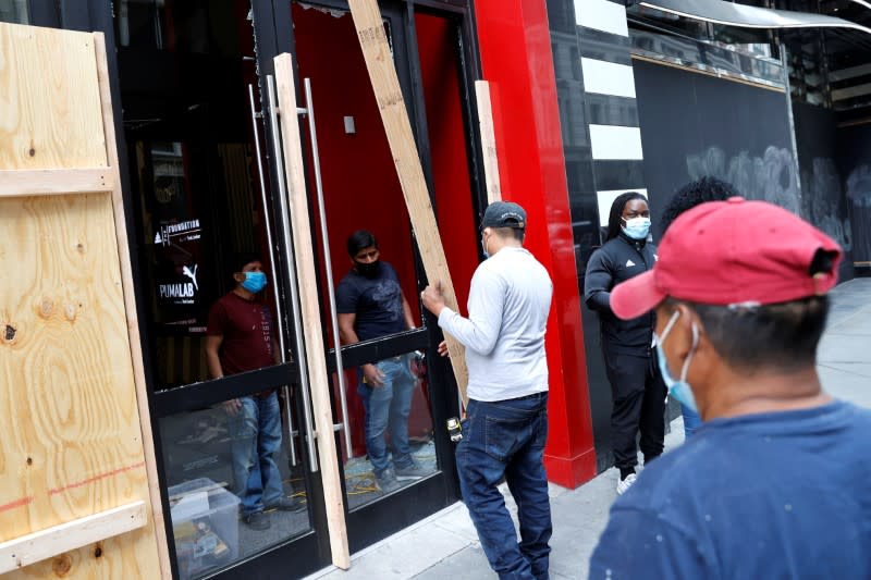 Damage and cleanup after protests against the death in Minneapolis police custody of George Floyd in New York