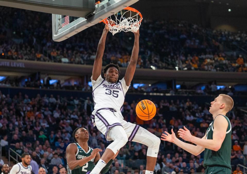 Kansas State’s Nae’Qwan Tomlin dunks the ball during the second half of their east region semifinal game against Michigan State at Madison Square Garden on Thursday night.