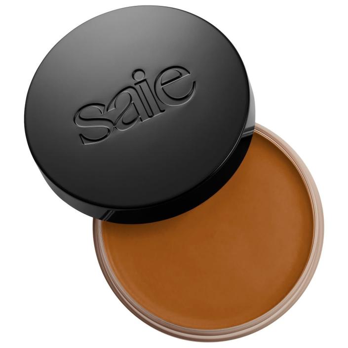 <p><strong>Saie</strong></p><p>sephora.com</p><p><strong>$28.00</strong></p><p>You won't ever have to worry about unevenness, blotches, or patches with Saie's smooth-as-butter bronzer that's packed with skin-loving ingredients, like nourishing grapeseed oil and soothing colloidal oatmeal, for a velvety, soft-to-the-touch, sun-kissed glow. Plus, "it's light and creamy, and easy to use," says Aharon.</p>