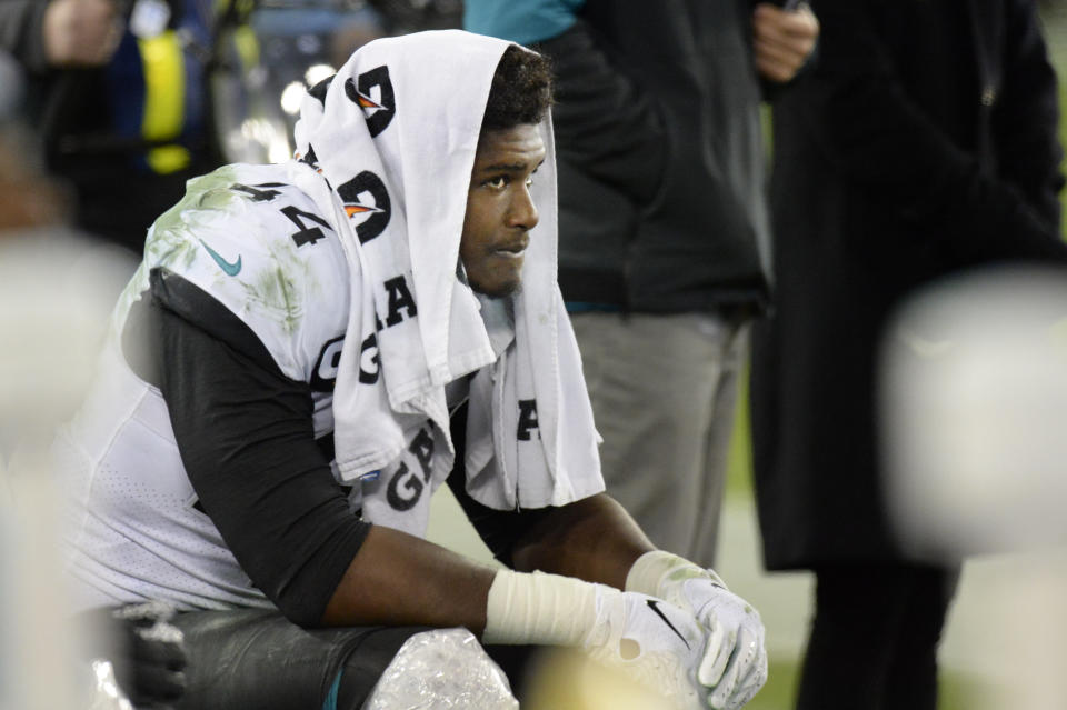 Jacksonville Jaguars linebacker Myles Jack sits on the bench late in the fourth quarter of an NFL football game against the Tennessee Titans Sunday, Nov. 24, 2019, in Nashville, Tenn. The Titans won 42-20. (AP Photo/Mark Zaleski)