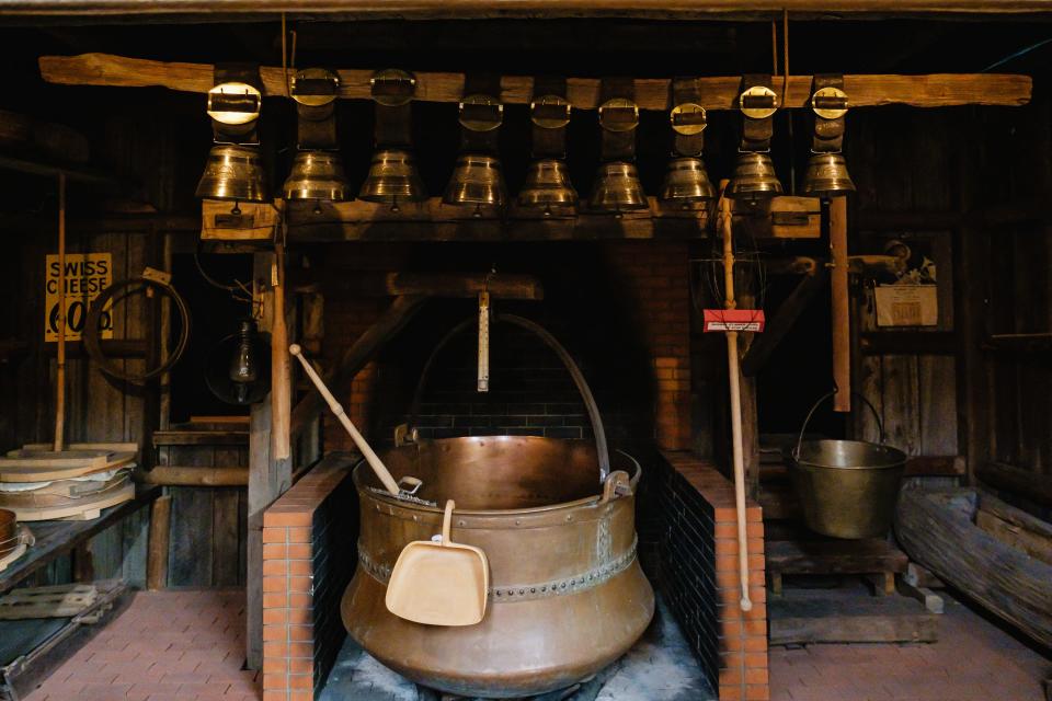 One of the most prominent displays in Sugarcreek's Alpine Hills Museum is a replication of a traditional cheese house, in which an original cheese kettle over 100 years old from Sharp Run Dairy, East of Millersberg, can be seen. Cheesemakers in the 1980's were forced to switch from the use of copper to stainless steel because of regulations.