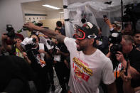 Toronto Raptors forward Kawhi Leonard celebrates with teammates after the Raptors defeated the Golden State Warriors in Game 6 of basketball's NBA Finals in Oakland, Calif., Thursday, June 13, 2019. (AP Photo/Tony Avelar)