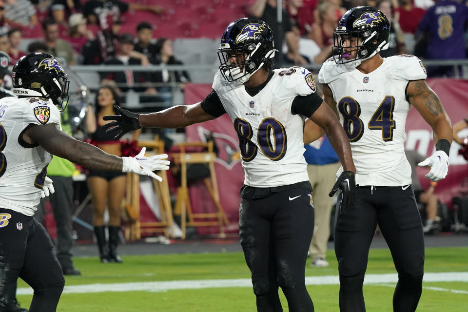 Baltimore Ravens tight end Isaiah Likely (80) celebrates his touchdown with teammates during the first half of an NFL preseason football game against the Arizona Cardinals, Sunday, Aug. 21, 2022, in Glendale, Ariz. (AP Photo/Darryl Webb)