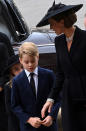 <p>Kate reached out for George's hand as they exited their car and went into the service together as a family. </p>