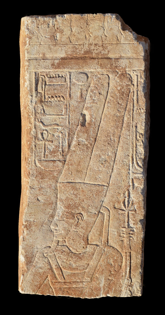 Here, the upper part of the Egyptian carving, showing the hieroglyph of Amun (top left); the hieroglyph and the god's face were hacked out on orders of pharaoh Akhenaten (reign 1353-1336 B.C) and were later restored.