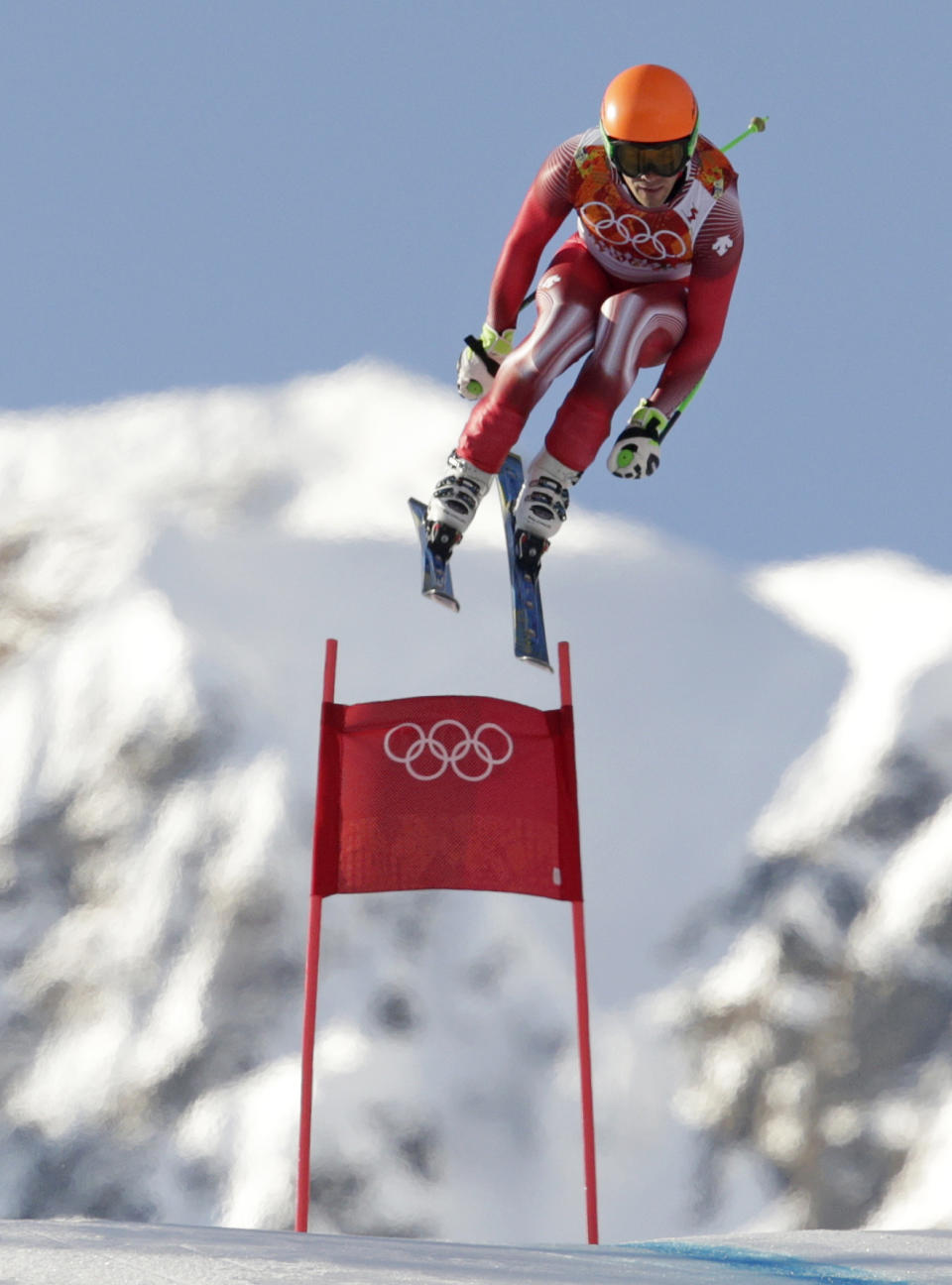 Switzerland's Sandro Viletta jumps during the downhill portion of the men's supercombined at the Sochi 2014 Winter Olympics, Friday, Feb. 14, 2014, in Krasnaya Polyana, Russia. (AP Photo/Charles Krupa)