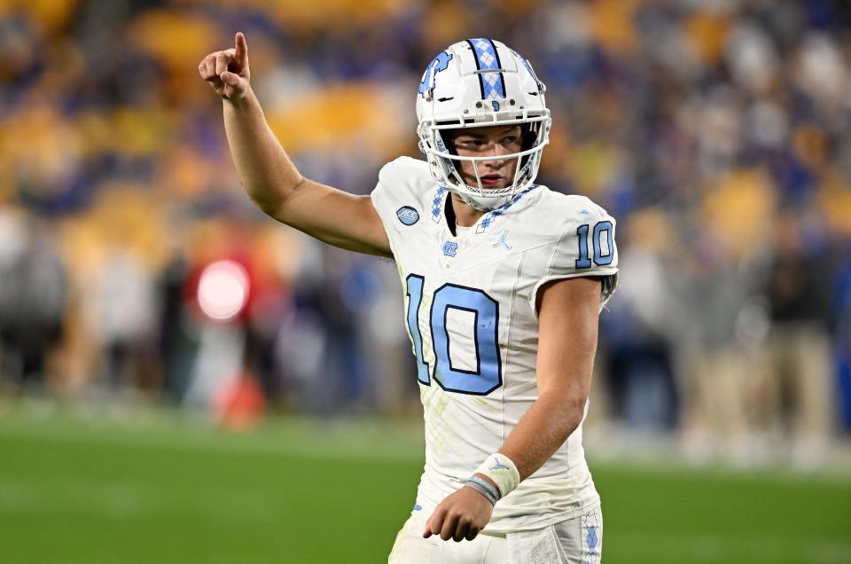 PITTSBURGH, PENNSYLVANIA - SEPTEMBER 23: Drake Maye #10 of the North Carolina Tar Heels celebrates after a North Carolina Tar Heels touchdown in the first quarter against the Pittsburgh Panthers at Acrisure Stadium on September 23, 2023 in Pittsburgh, Pennsylvania. (Photo by Greg Fiume/Getty Images)