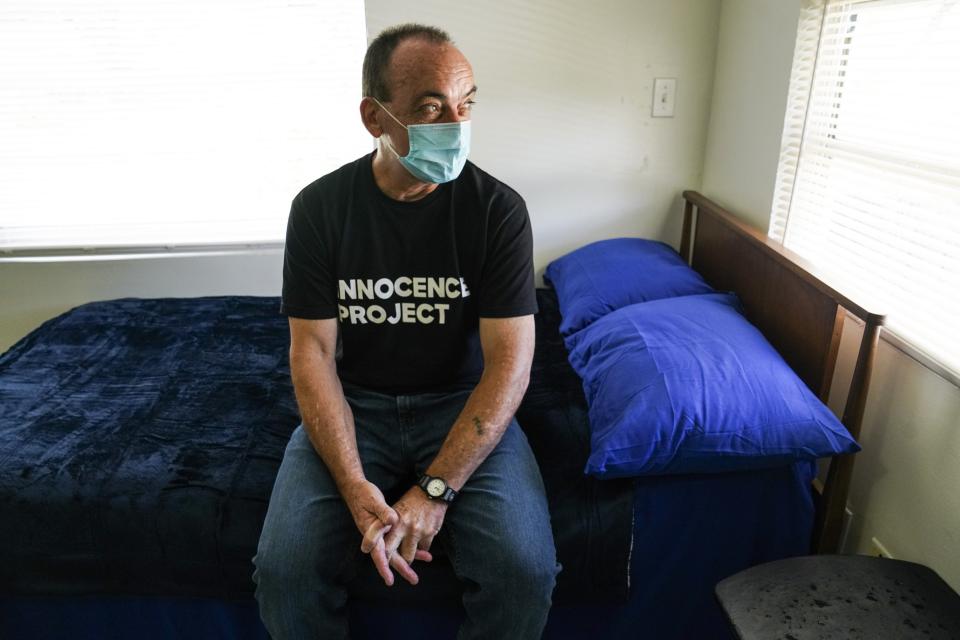 Robert Duboise is pictured on his bed at his new home, on Friday, Sept. 11, 2020 in Tampa. The Florida man who spent the last 37 years in prison on a rape and murder charge was freed from prison after officials discovered dramatic new evidence that proved his innocence. (Martha Asencio Rhine/Tampa Bay Times via AP)