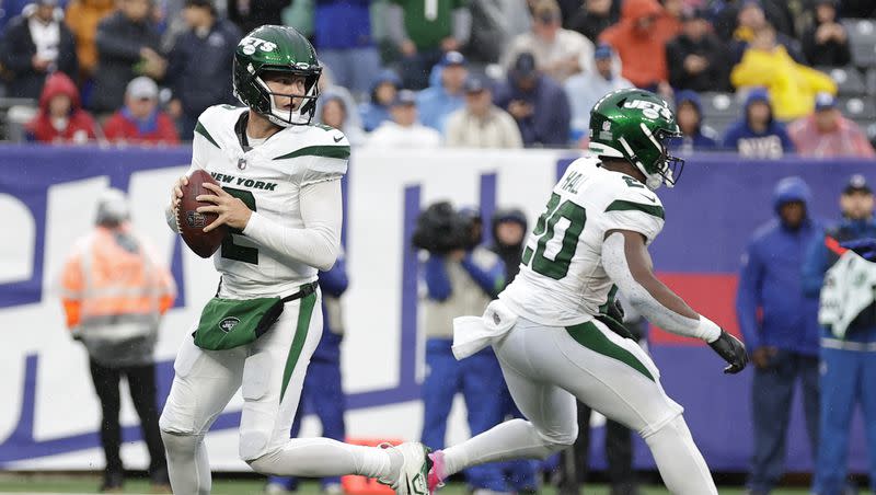 New York Jets quarterback Zach Wilson (2) looks to pass during the second half of an NFL football game against the New York Giants, Sunday, Oct. 29, 2023, in East Rutherford, N.J. 
