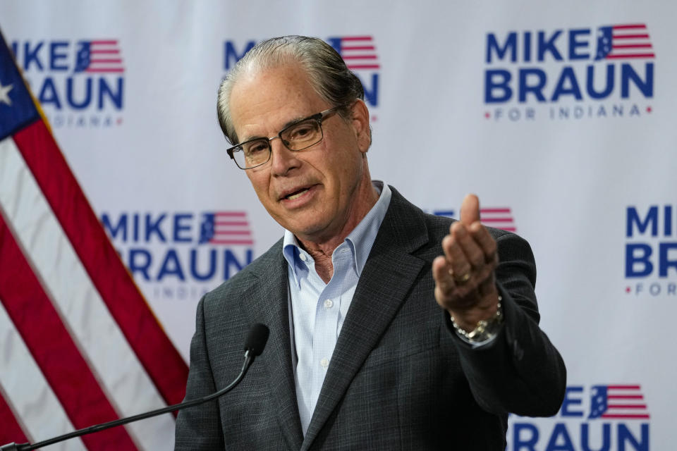 U.S. Sen. Mike Braun, R-Ind., announces in Indianapolis, Monday, Dec. 12, 2022 that he will for Indiana governor in 2024. Braun will face Indiana Lt. Gov. Suzanne Crouch for the Republican nomination. (AP Photo/Michael Conroy)